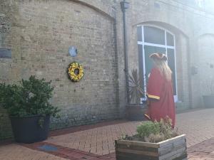 The Mayor of Lowestoft lays a wreath at Lowestoft Railway Station