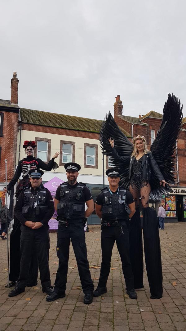 Stilt Walkers (part of the Spooky Saturday event) and Lowestoft Police Officers