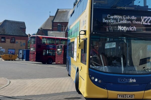 An image of a bus pulling out of the bus station