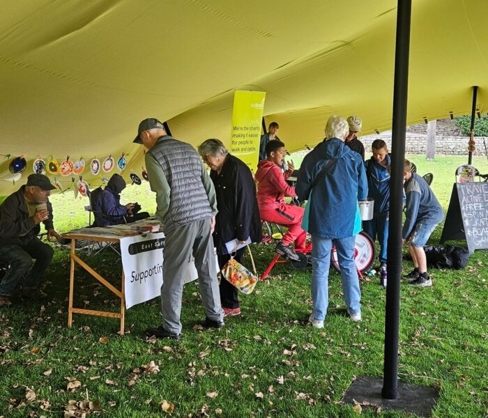 An image of people wandering around looking at stalls