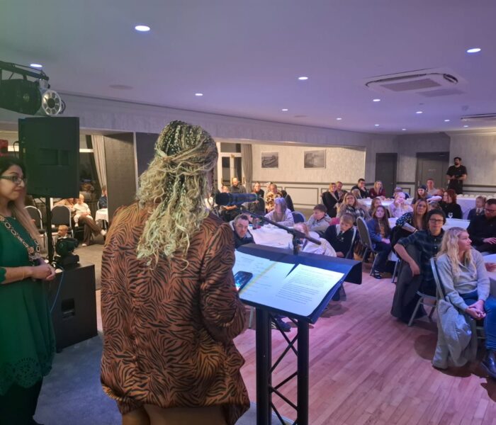 Photo of people gathered at an awards ceremony