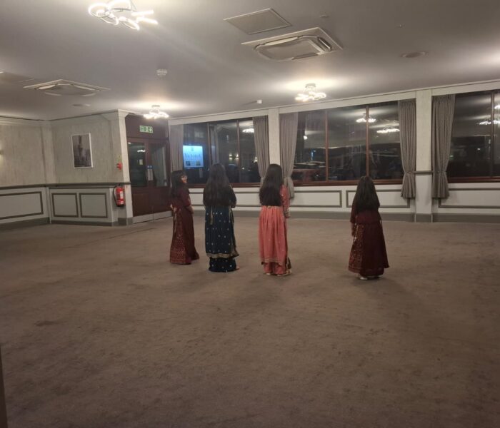 Image of four people dancing