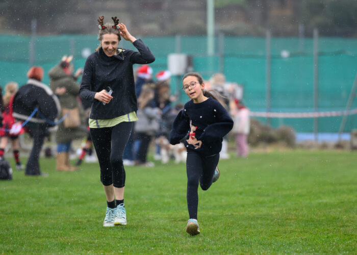 Two people running