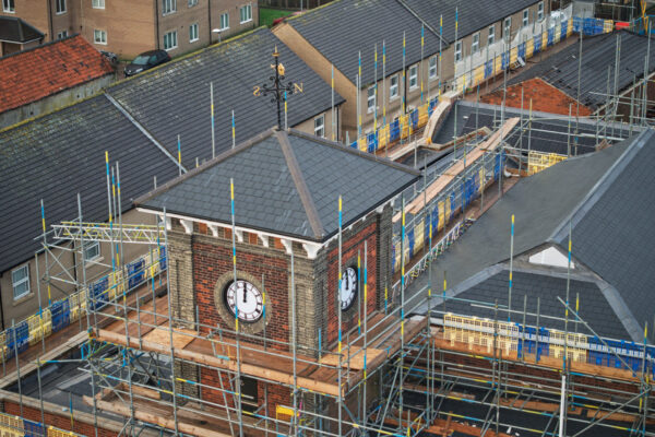 An aerial shot of the clock tower on the town hall