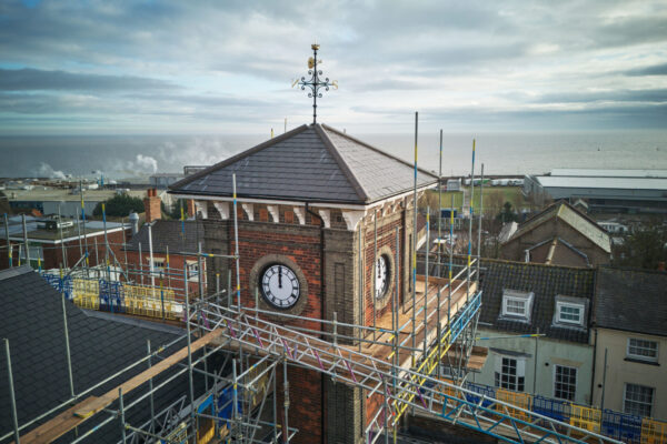 An aerial shot of the clock tower on the town hall
